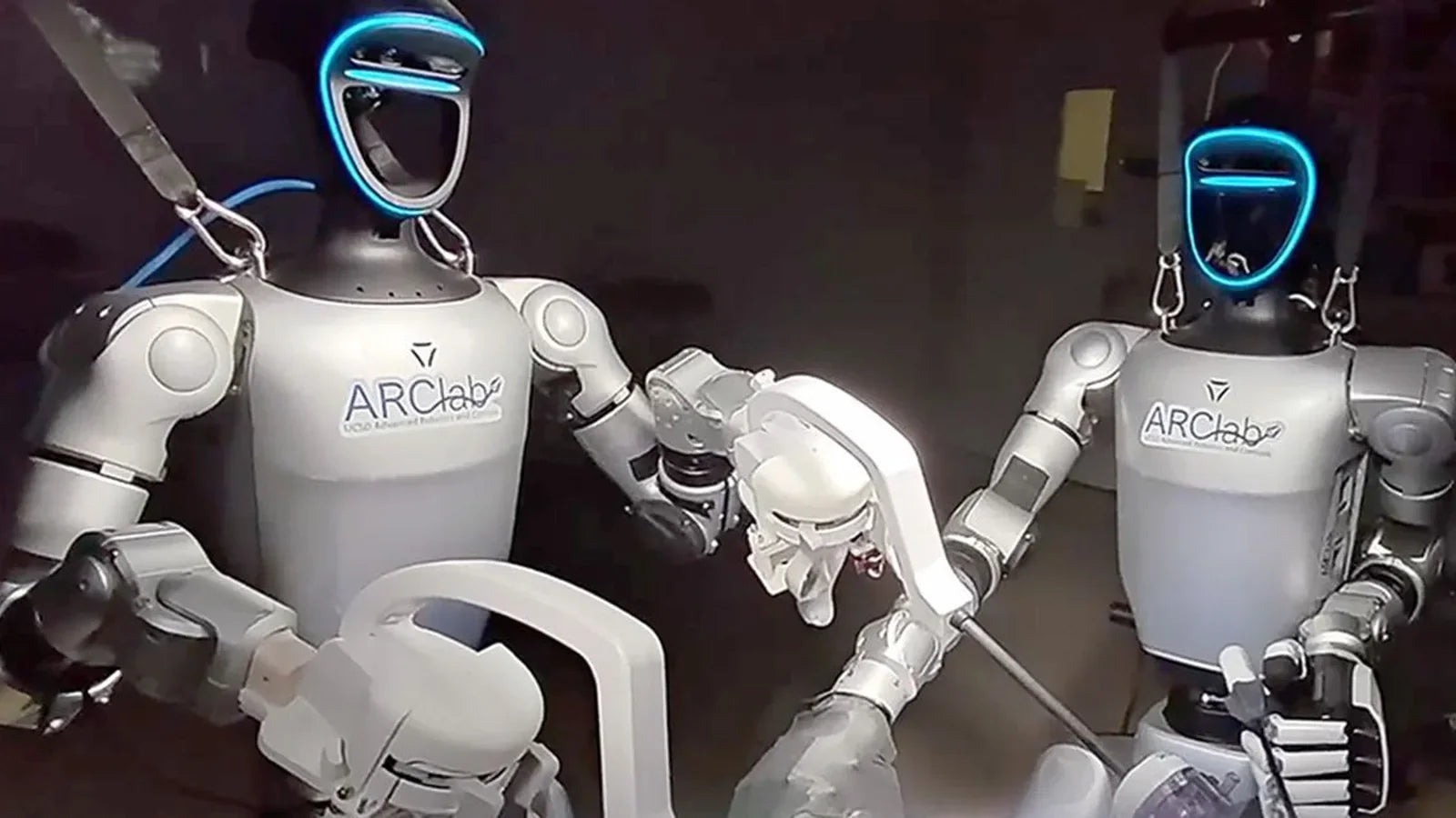 Two teleoperated humanoid robots used during a UC San Diego preclinical laparoscopic surgery study.